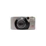 Câmara Canon Prima Super 105 point&shoot — vista frontal, disponível na LX-FILM