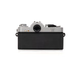 Nikkormat EL + Nikkor 50mm F1.4 câmara slr — vista lateral, disponível na LX-FILM