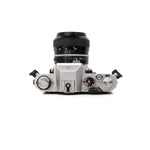 Nikkormat EL + Nikkor 50mm F1.4 câmara slr — vista superior, disponível na LX-FILM