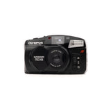 Olympus Superzoom 700 XB point&shoot camera — front view, available at LX-FILM